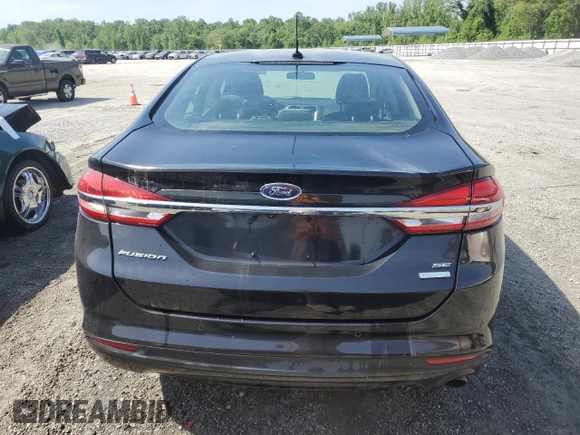 2018 Ford Fusion SE z VIN 3FA6P0HD9JR157594, wystawiony jako Copart lot #55539515 z przebiegiem 164 403 mil mil oraz Czysty tytuł • Clean title. Historia ofert i sprzedaży dostępna na DreamBid. Obrazek 6.