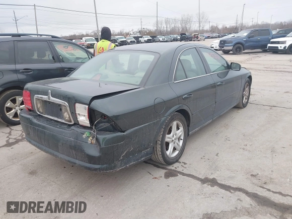 2002 Lincoln LS w/Base Pkg with VIN 1LNHM87A92Y685863, listed as a IAAI auction lot 41457021 with 145,022 mi miles. Bid and sale history available at carsss.com. Image 4.