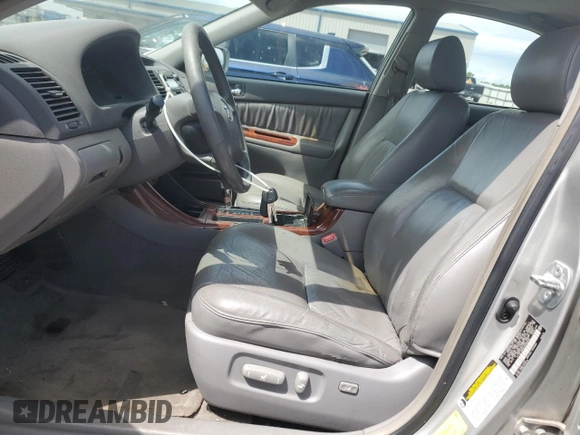 2004 Toyota Camry LE with VIN 4T1BF30K84U588220, listed as a Copart auction lot 54441185 with 165,890 mi miles and Non Repairable. Bid and sale history available at carsss.com. Image 7.