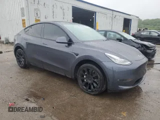 2021 Tesla Model Y Long Range z VIN 5YJYGDEE6MF209034, wystawiony jako Copart lot #57313585 z przebiegiem 54 259 mil mil oraz Szkoda całkowita • Salvage title. Historia ofert i sprzedaży dostępna na DreamBid. Obrazek 4.