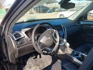 2015 Cadillac SRX with VIN 3GYFNAE35FS608595, listed as a IAAI auction lot 41282751 with 127,055 mi miles and . Bid and sale history available at DreamBid. Image 18.
