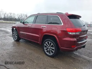 2017 Jeep Grand Cherokee Overland with VIN 1C4RJFCG5HC854024, listed as a IAAI auction lot 42006307 with 118,640 mi miles. Bid and sale history available at carsss.com. Image 3.