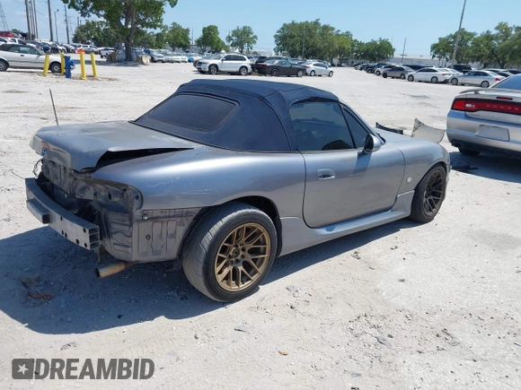 2003 Mazda MX-5 Miata Cloth with VIN JM1NB353930311340, listed as a IAAI auction lot 42145967 with 194,740 mi miles and . Bid and sale history available at DreamBid. Image 4.