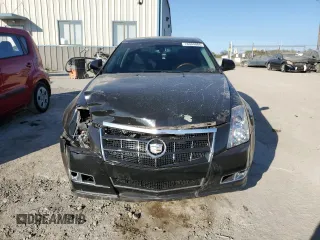 2009 Cadillac CTS AWD w/1SB with VIN 1G6DT57V790104976, listed as a Copart auction lot 76904004 with 144,300 mi miles and Salvage Title. Bid and sale history available at carsss.com. Image 5.