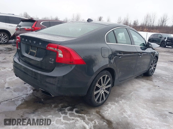 2015 Volvo S60 T5 Premier z VIN YV1612TK3F1359338, wystawiony jako IAAI lot #41645209 z przebiegiem 106 822 mil mil oraz . Historia ofert i sprzedaży dostępna na DreamBid. Obrazek 4.