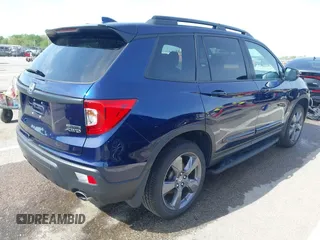 2020 Honda Passport Touring z VIN 5FNYF8H94LB015299, wystawiony jako IAAI lot #42064416 z przebiegiem 62 397 mil mil oraz . Historia ofert i sprzedaży dostępna na DreamBid. Obrazek 4.