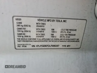 2020 Tesla Model Y Long Range with VIN 5YJYGDEF2LF006357, listed as a Copart auction lot 54888215 with 55,983 mi miles and Salvage Title. Bid and sale history available at DreamBid. Image 12.