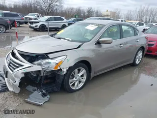 2013 Nissan Altima 2.5 S with VIN 1N4AL3AP3DC261559, listed as a IAAI auction lot 41959475 with 87,704 mi miles. Bid and sale history available at carsss.com. Image 2.