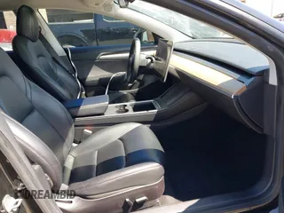 2021 Tesla Model 3 Long Range with VIN 5YJ3E1EB4MF064631, listed as a IAAI auction lot 41424856 with 95,511 mi miles and . Bid and sale history available at DreamBid. Image 5.