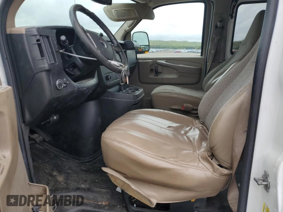 2011 GMC Savana z VIN 1GTS7AF43B1144482, wystawiony jako Copart lot #57389205 z przebiegiem 140 013 mil mil oraz Szkoda całkowita • Salvage title. Historia ofert i sprzedaży dostępna na DreamBid. Obrazek 7.