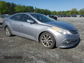 2015 Hyundai Azera z VIN KMHFG4JGXFA483472, wystawiony jako Copart lot #52216745 z przebiegiem 130 758 mil mil oraz Szkoda całkowita • Salvage title. Historia ofert i sprzedaży dostępna na DreamBid. Obrazek 4.
