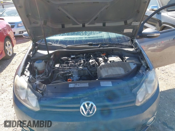 2012 Volkswagen Golf TDI z VIN WVWDM7AJ9CW240204, wystawiony jako IAAI lot #41837287 z przebiegiem 172 512 mil mil oraz . Historia ofert i sprzedaży dostępna na DreamBid. Obrazek 10.