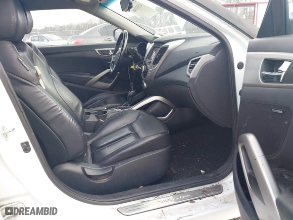 2014 Hyundai Veloster with VIN KMHTC6ADXEU213073, listed as a IAAI auction lot 41551346 with 130,549 mi miles. Bid and sale history available at carsss.com. Image 5.
