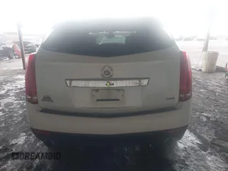 2014 Cadillac SRX z VIN 3GYFNAE32ES580480, wystawiony jako IAAI lot #42170765 z przebiegiem 148 245 mil mil oraz . Historia ofert i sprzedaży dostępna na DreamBid. Obrazek 16.