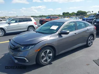 2020 Honda Civic LX with VIN 19XFC2F68LE007735, listed as a IAAI auction lot 42215294 with 3,849 mi miles and . Bid and sale history available at DreamBid. Image 17.