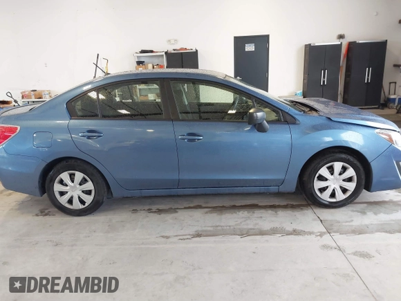 2016 Subaru Impreza z VIN JF1GJAA64GH004932, wystawiony jako IAAI lot #41652329 z przebiegiem 101 016 mil mil oraz . Historia ofert i sprzedaży dostępna na DreamBid. Obrazek 13.