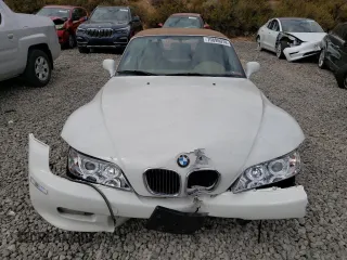2000 BMW Z3 2.5 z VIN 4USCH9340YLG03496, wystawiony jako Copart lot #70895974 z przebiegiem 115 664 mil mil oraz Szkody całkowita. Historia ofert i sprzedaży dostępna na DreamBid. Obrazek 5.