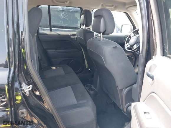 2014 Jeep Patriot Latitude with VIN 1C4NJRFB3ED615996, listed as a IAAI auction lot 41871099 with 120,000 mi miles. Bid and sale history available at carsss.com. Image 8.
