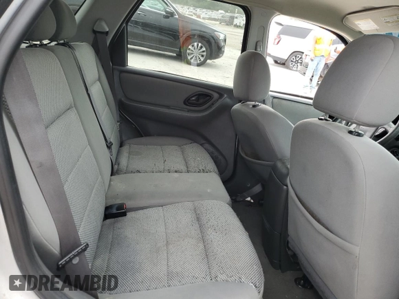 2005 Ford Escape XLT with VIN 1FMYU93165KA25072, listed as a Copart auction lot 61224855 with Not provided miles and Salvage title. Bid and sale history available at DreamBid. Image 11.