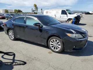 2015 Lexus ES 300h with VIN JTHBW1GG0F2091282, listed as a Copart auction lot 52354015 with 157,780 mi miles and Salvage title. Bid and sale history available at DreamBid. Image 4.