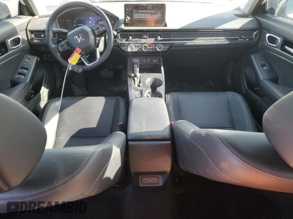 2023 Honda Civic Touring z VIN 2HGFE1F95PH314838, wystawiony jako Copart lot #52545085 z przebiegiem 29 863 mil mil oraz Szkoda całkowita • Salvage title. Historia ofert i sprzedaży dostępna na DreamBid. Obrazek 8.