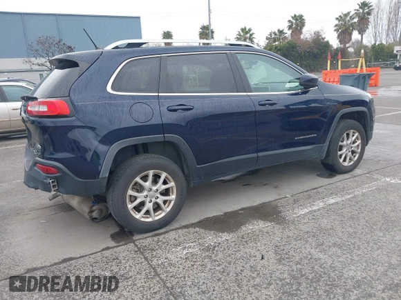 2015 Jeep Cherokee Latitude with VIN 1C4PJMCS2FW538575, listed as a IAAI auction lot 41799474 with 88,197 mi miles and . Bid and sale history available at DreamBid. Image 4.