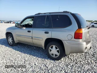 2003 GMC Envoy SLT z VIN 1GKDS13S032373020, wystawiony jako Copart lot #54986765 z przebiegiem 235 711 mil mil oraz Tytuł czysty. Historia ofert i sprzedaży dostępna na DreamBid. Obrazek 2.