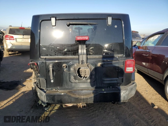 2011 Jeep Wrangler Sahara with VIN 1J4GA5D16BL567739, listed as a Copart auction lot 73542244 with 282,392 mi miles and Non Repairable. Bid and sale history available at DreamBid. Image 6.