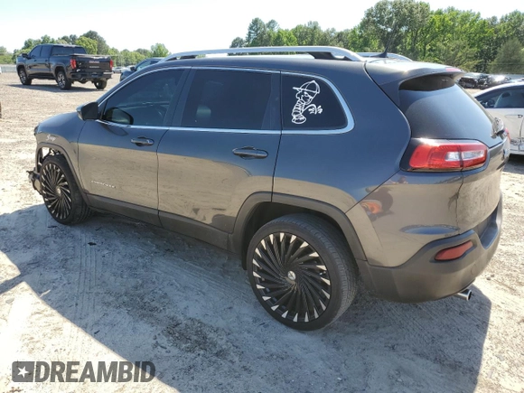 2017 Jeep Cherokee Latitude z VIN 1C4PJLCB8HW640881, wystawiony jako Copart lot #57718415 z przebiegiem 185 761 mil mil oraz Szkoda całkowita • Salvage title. Historia ofert i sprzedaży dostępna na DreamBid. Obrazek 2.