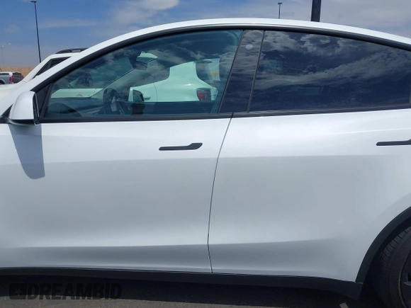 2022 Tesla Model Y Performance with VIN 7SAYGDEF8NF407109, listed as a IAAI auction lot 42014282 with 24,937 mi miles and . Bid and sale history available at DreamBid. Image 14.