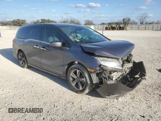 2019 Honda Odyssey Touring with VIN 5FNRL6H85KB022527, listed as a Copart auction lot 43851485 with 104,332 mi miles and Salvage Title. Bid and sale history available at carsss.com. Image 4.