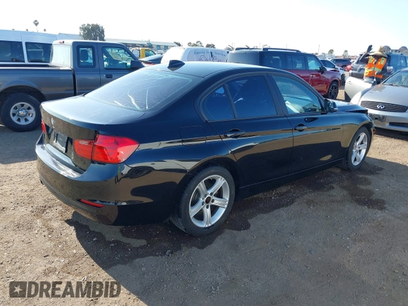 2013 BMW 3 Series 320i with VIN WBA3B1C57DF461779, listed as a IAAI auction lot 41991156 with 134,592 mi miles. Bid and sale history available at carsss.com. Image 4.