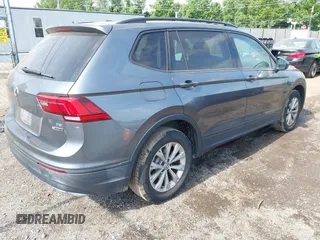 2018 Volkswagen Tiguan S with VIN 3VV0B7AX5JM108306, listed as a IAAI auction lot 42741783 with 71,040 mi miles and . Bid and sale history available at DreamBid. Image 4.