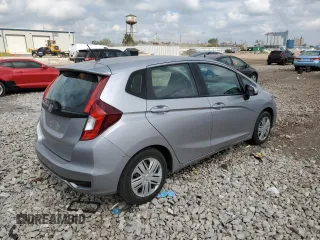 2019 Honda Fit LX z VIN 3HGGK5H47KM722595, wystawiony jako Copart lot #56819975 z przebiegiem 31 371 mil mil oraz Szkoda całkowita • Salvage title. Historia ofert i sprzedaży dostępna na DreamBid. Obrazek 3.