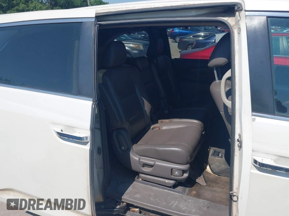 2014 Honda Odyssey EX-L z VIN 5FNRL5H61EB001509, wystawiony jako IAAI lot #42371539 z przebiegiem 259 195 mil mil oraz . Historia ofert i sprzedaży dostępna na DreamBid. Obrazek 8.