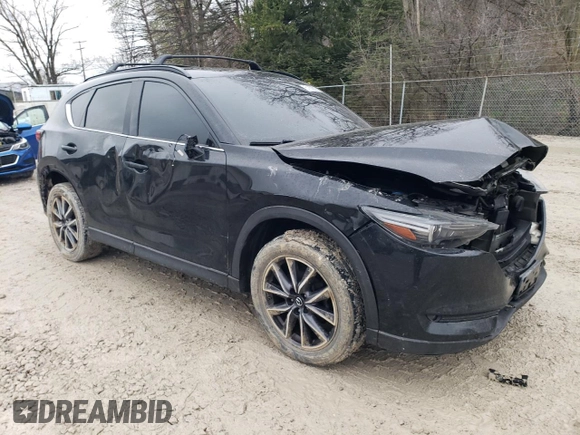 2018 Mazda CX-5 Grand Touring with VIN JM3KFBDM0J0327927, listed as a Copart auction lot 51800825 with 203,126 mi miles and Clean Title. Bid and sale history available at carsss.com. Image 4.