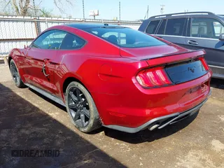 2019 Ford Mustang EcoBoost with VIN 1FA6P8TH4K5106131, listed as a IAAI auction lot 41895726 with 70,906 mi miles and . Bid and sale history available at carsss.com. Image 3.
