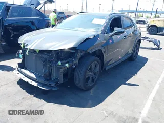 2021 Lexus UX 250h z VIN JTHP9JBH2M2048461, wystawiony jako IAAI lot #42017871 z przebiegiem 56 537 mil mil oraz . Historia ofert i sprzedaży dostępna na DreamBid. Obrazek 2.
