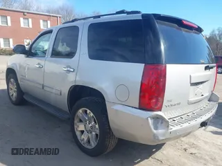 2011 GMC Yukon SLT with VIN 1GKS2CE01BR186874, listed as a IAAI auction lot 41762705 with 249,283 mi miles. Bid and sale history available at carsss.com. Image 3.