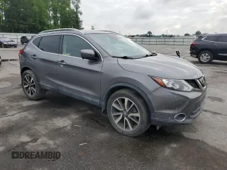 2019 Nissan Rogue S with VIN JN1BJ1CP0KW226420, listed as a Copart auction lot 54144235 with 140,341 mi miles and Clean Title. Bid and sale history available at DreamBid. Image 4.