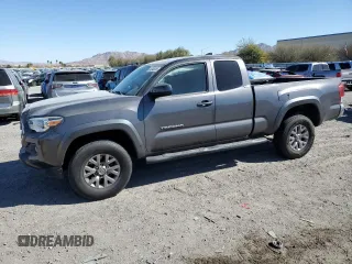 2016 Toyota Tacoma SR with VIN 5TFRX5GN8GX059736, listed as a Copart auction lot 46949285 with 103,716 mi miles and Salvage Title. Bid and sale history available at carsss.com. Image 1.