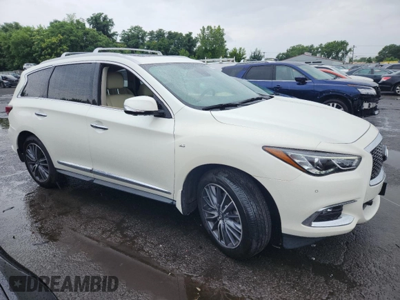 2020 Infiniti QX60 Luxe with VIN 5N1DL0MM6LC516108, listed as a Copart auction lot 63279805 with 97,965 mi miles and Salvage title. Bid and sale history available at DreamBid. Image 4.