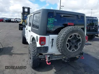 2016 Jeep Wrangler Unlimited Rubicon with VIN 1C4HJWFG7GL254143, listed as a IAAI auction lot 41781962 with 114,435 mi miles and . Bid and sale history available at DreamBid. Image 3.