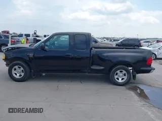 2002 Ford F-150 XL z VIN 1FTRX07W12KD47521, wystawiony jako IAAI lot #42044623 z przebiegiem 334 930 mil mil oraz . Historia ofert i sprzedaży dostępna na DreamBid. Obrazek 15.