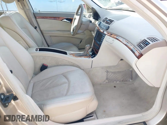 2005 Mercedes-Benz E-Class 3.2L with VIN WDBUF65J05A706096, listed as a IAAI auction lot 41482289 with 110,531 mi miles. Bid and sale history available at carsss.com. Image 5.
