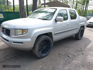2006 Honda Ridgeline RTS with VIN 2HJYK16456H567706, listed as a IAAI auction lot 42109917 with 204,256 mi miles. Bid and sale history available at carsss.com. Image 2.