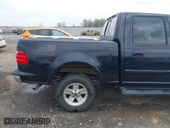 2002 Ford F-150 XLT with VIN 1FTRW08L32KD90202, listed as a IAAI auction lot 41850546 with 256,807 mi miles. Bid and sale history available at carsss.com. Image 20.