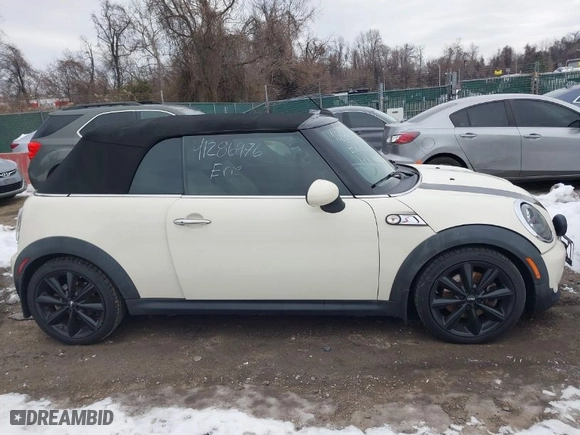 2015 MINI Cooper Convertible S with VIN WMWZP3C5XFT299044, listed as a IAAI auction lot 41286976 with 80,858 mi miles. Bid and sale history available at carsss.com. Image 14.