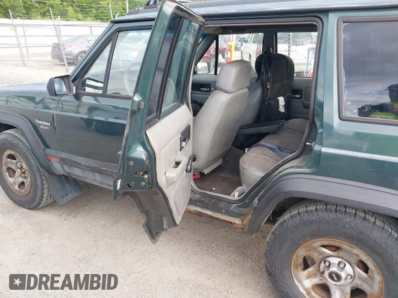 1993 Jeep Cherokee Sport with VIN 1J4FJ68S2PL622716, listed as a IAAI auction lot 42570145 with 183,159 mi miles and . Bid and sale history available at DreamBid. Image 8.