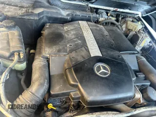 2002 Mercedes-Benz G-Class with VIN WDCYR49E22X132146, listed as a Copart auction lot 85449444 with 208,917 mi miles and Salvage Title. Bid and sale history available at carsss.com. Image 7.